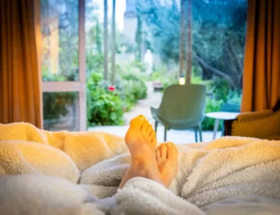 Bare feet on a blanket, looking out over the garden at 81 On Church